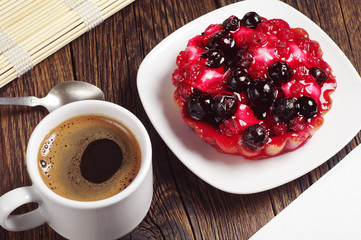 Coffee and tasty cake with berries