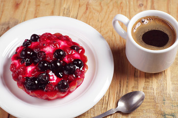 Delicious cake with currants and coffee