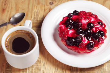 Coffee and delicious cake with currants