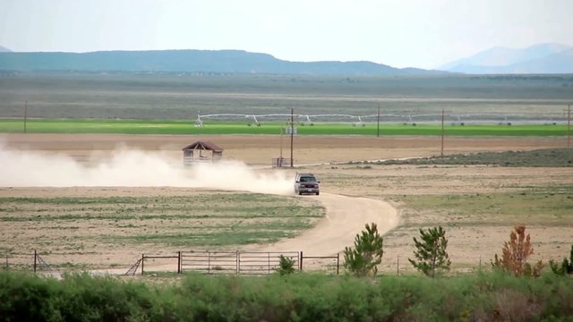 Truck is Crossing a Field