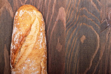 food background - baguette bread on wood table