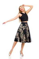 Fototapeta premium Woman in floral dark skirt isolated on white
