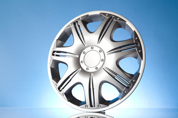 alloy wheel on blue background