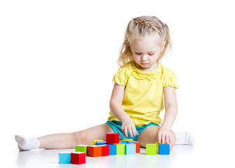 kid playing wooden toys