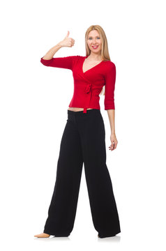 Young woman in flared pants isolated on white