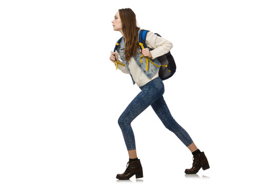 Pretty girl with rucksack isolated on white