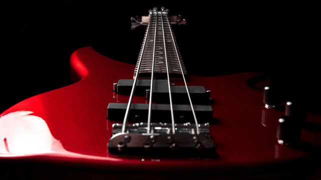 Bass guitar close-up. Photo in low key