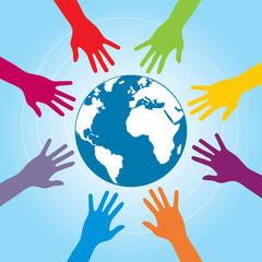 Fototapeta premium Human arms colored around the globe with the world map.