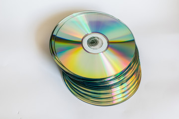 compact discs and digital versatile disc on a white background