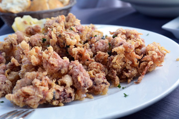 Fried small squid. Closeup photo.