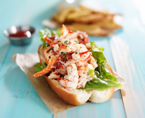 lobster roll on colorful retro painted wooden planks