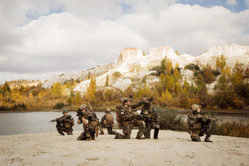 Soldiers takes a break on a berm during patrol the area