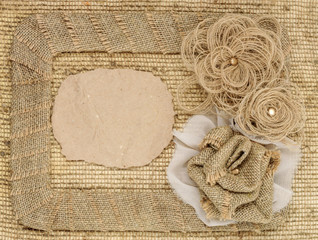 Fototapeta na wymiar The framework is made of burlap and roses with space for text