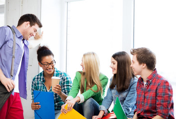 students communicating and laughing at school