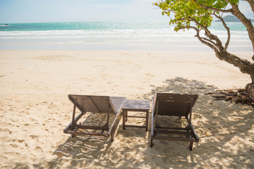 Beach and chair on sand beach.