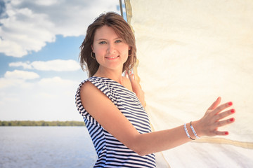 Fototapeta na wymiar sexy girl on the deck yacht