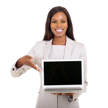 African Businesswoman Presenting Black Laptop Screen