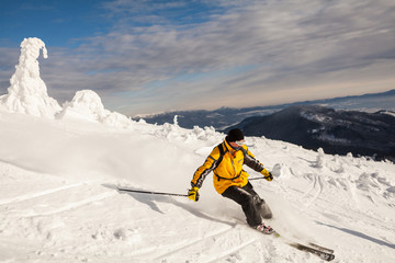 Man Snow Skiing Against Blue Sky