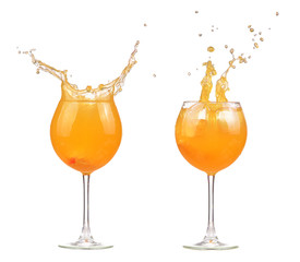 Fototapeta na wymiar Colorful orange juice make splash in glass isolated on white