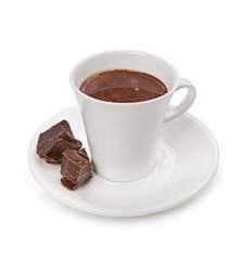 Hot chocolate and chocolate pieces isolated on white background