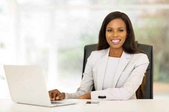 african american business woman using laptop computer