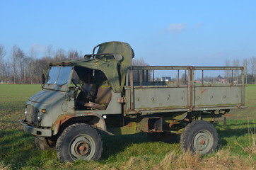 old truck in meadow