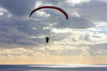 paraglider at dusk