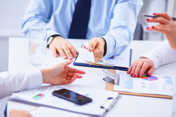 Group of business people working together in office