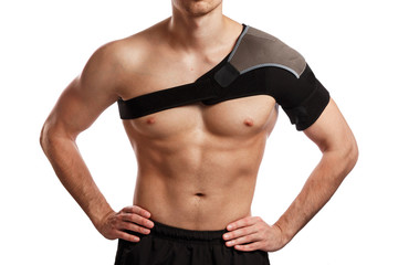 Fototapeta premium Sportsman with a support bandage on his shoulder
