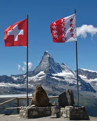 Fotobehang Flags of Switzerland and Wallis Canton, Matterhorn © u.perreten