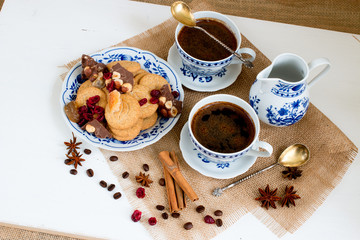 Coffee with sweets. White-blue porcelain.