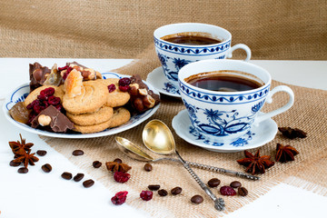 Coffee with sweets. White-blue porcelain.