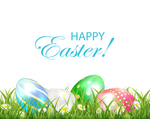 Easter eggs in the green grass