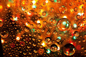 Abstract background texture drops of water and art light on glas