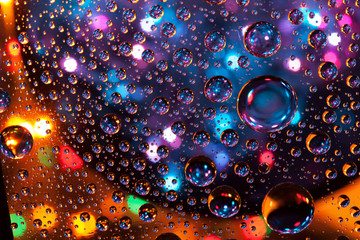 Abstract background texture drops of water and art light on glas