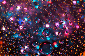 Abstract background texture drops of water and art light on glas