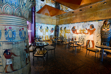 Superb cafe with walls painted in Egyptian style
