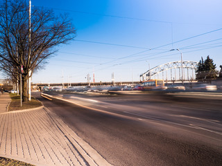 Fototapeta na wymiar Blured car at day light on a busy city 