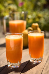 Two glasses of freshly prepared papaya juice