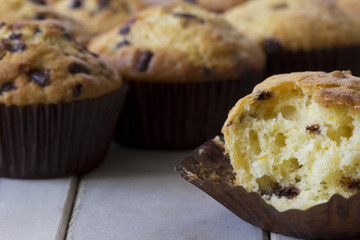 Orange and Chocolate Muffins on a Table