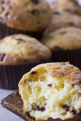 Orange and Chocolate Muffins on a Table