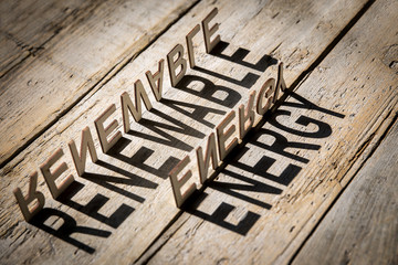 Wooden letters build the word renewable energy