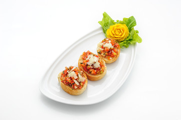 Bruschetta with tomato and onion studio shot