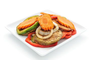 Fried eggplant with vegetables studio shot