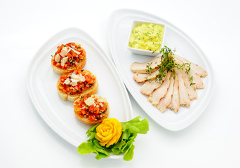 Set of international dishes arranged for catering, studio shot