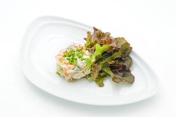 Cheese salad with vegetables anf lettuce studio shot