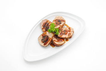 Pork roll with prune studio shot