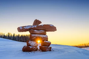 Foto op Canvas Inukshuk with setting sun © smcfeeters