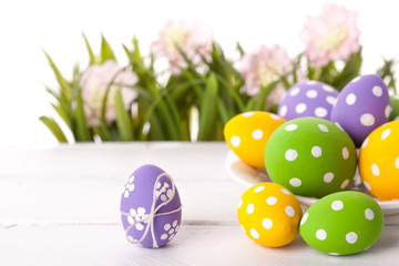 Easter Eggs with flower on Fresh Green Grass