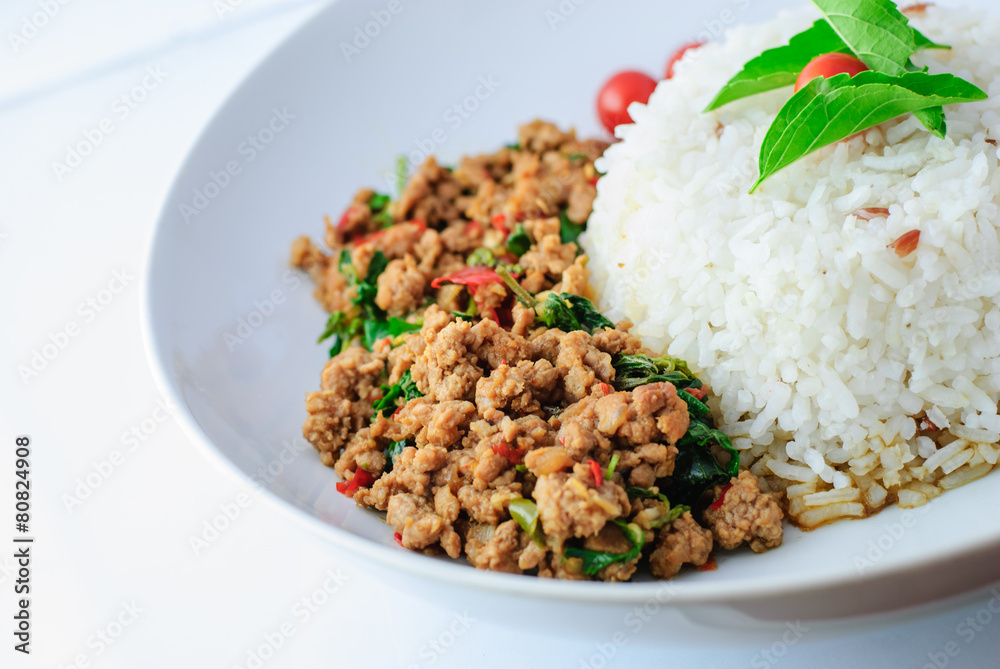 Wall mural rice topped with stir-fried pork and basil